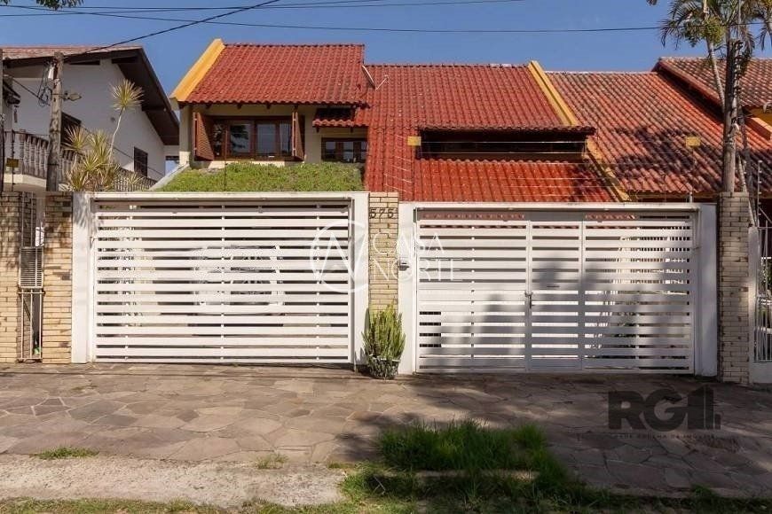 Casa à venda com 4 quartos, 350m², 1 suíte, 3 vagas, Rua Doutor Paulino Guerra no bairro Jardim Itu em Porto Alegre