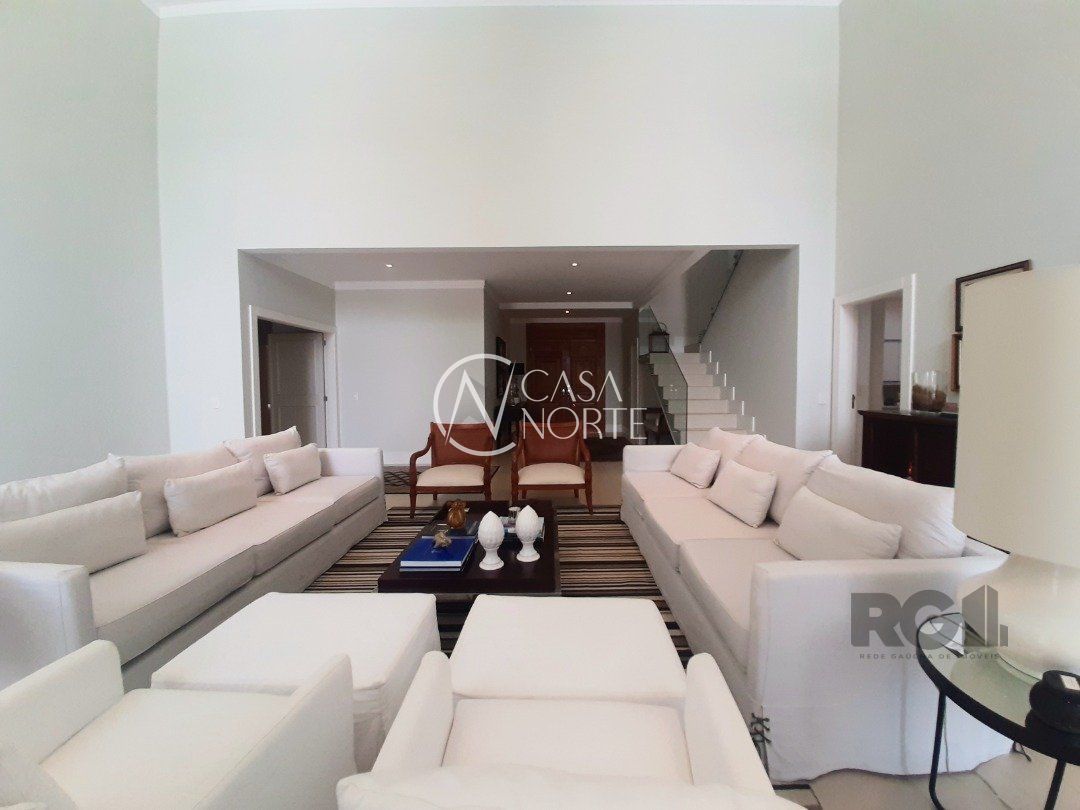 Casa de Condomínio à venda com 4 quartos, 423m², 4 suítes, 4 vagas, Avenida Juca Batista no bairro Belém Novo em Porto Alegre