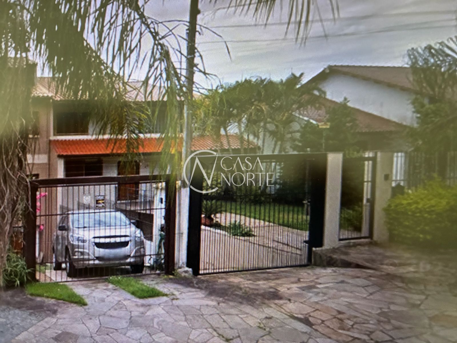 Casa à venda com 4 quartos, 382m², 1 suíte, 2 vagas, Rua Professor Othon Santos Silva no bairro Aberta dos Morros em Porto Alegre