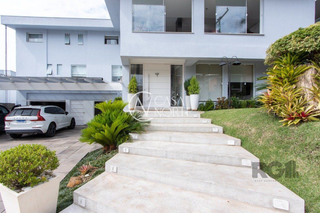 Casa de Condomínio à venda com 6 quartos, 564m², 6 suítes, 4 vagas, Rua Sinke no bairro Santa Tereza em Porto Alegre