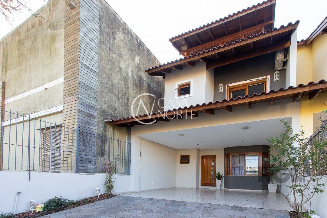 Casa à venda com 5 quartos, 300m², 1 suíte, 2 vagas, Rua Claudio da Silva Pinto no bairro Espírito Santo em Porto Alegre