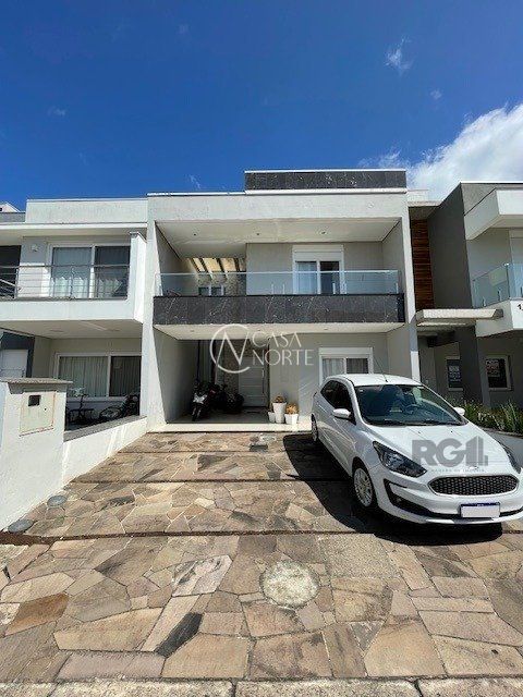 Casa de Condomínio à venda com 3 quartos, 199m², 1 suíte, 3 vagas, Rua Jorge Babot Miranda no bairro Aberta dos Morros em Porto Alegre