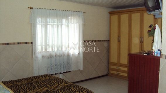 Casa à venda com 3 quartos, 300m², 1 suíte, 2 vagas, Rua Tunel Verde no bairro Ponta Grossa em Porto Alegre
