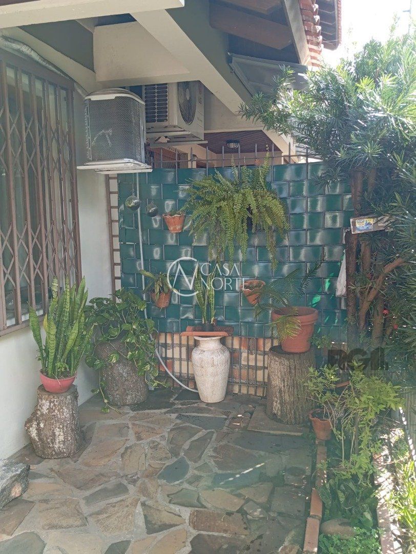 Casa de Condomínio à venda com 3 quartos, 105m², 1 suíte, 1 vaga, Rua Itapitocaí no bairro Cristal em Porto Alegre