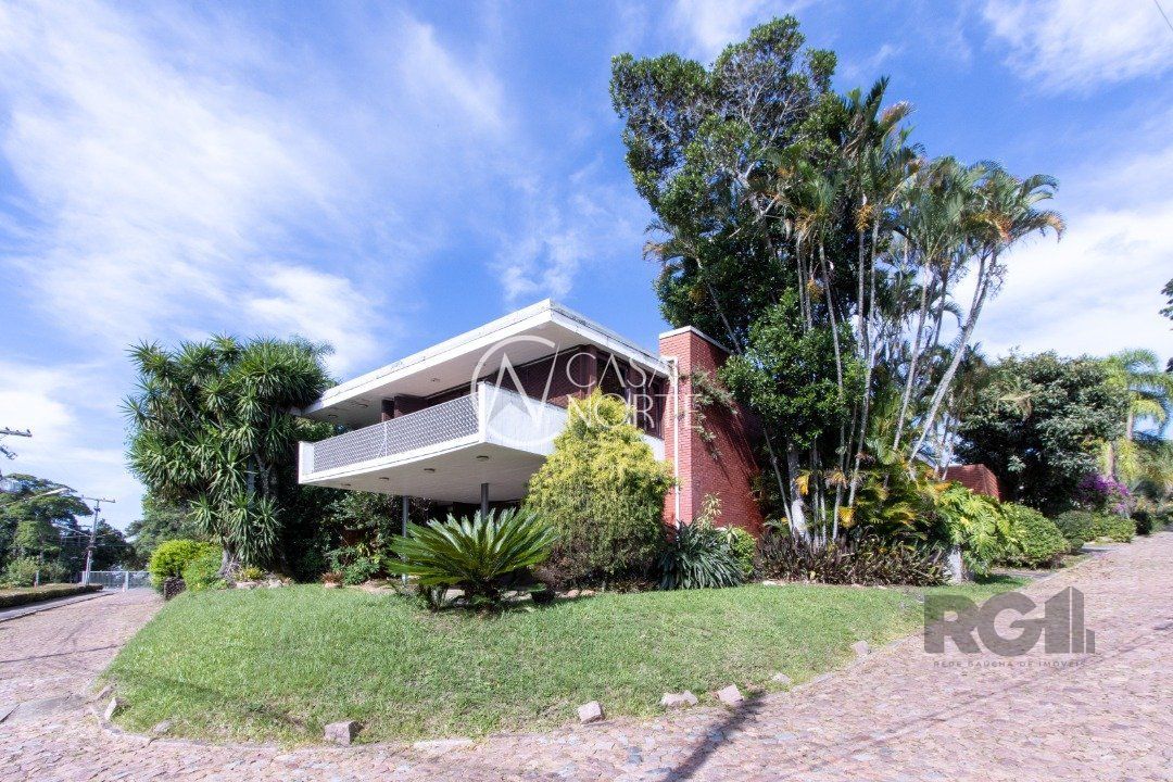 Casa de Condomínio à venda com 4 quartos, 724m², 4 suítes, 6 vagas, Rua Sinke no bairro Santa Tereza em Porto Alegre