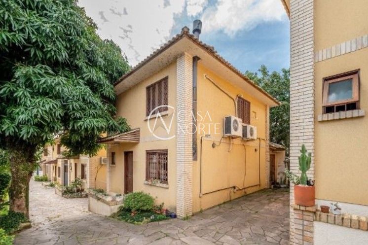 Casa de Condomínio à venda com 3 quartos, 141m², 1 suíte, 2 vagas, Rua Doutor Barcelos no bairro Tristeza em Porto Alegre