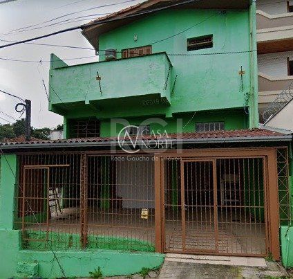 Casa à venda com 3 quartos, 360m², 1 vaga, Rua Oscar Schneider no bairro Medianeira em Porto Alegre