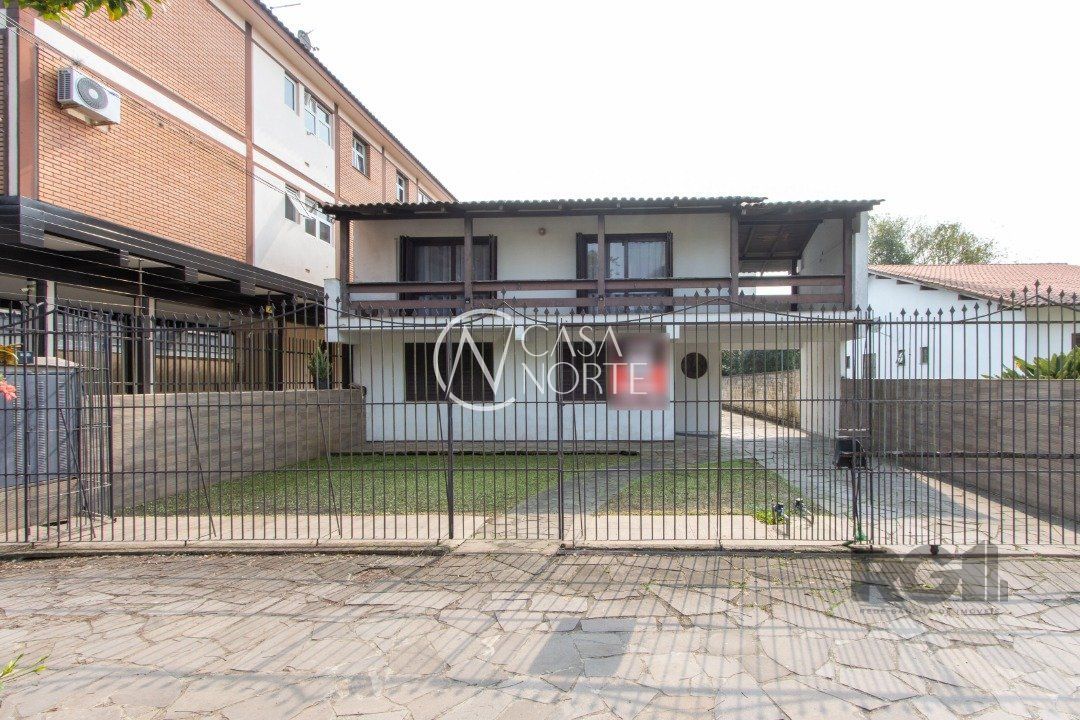 Casa à venda com 7 quartos, 481m², 2 suítes, 4 vagas, Rua Chico Pedro no bairro Camaquã em Porto Alegre