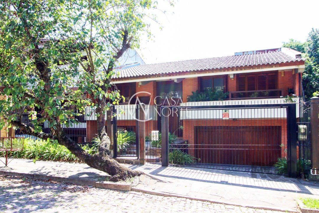 Casa à venda com 4 quartos, 362m², 1 suíte, 2 vagas, Rua Alcebíades Antônio dos Santos no bairro Nonoai em Porto Alegre