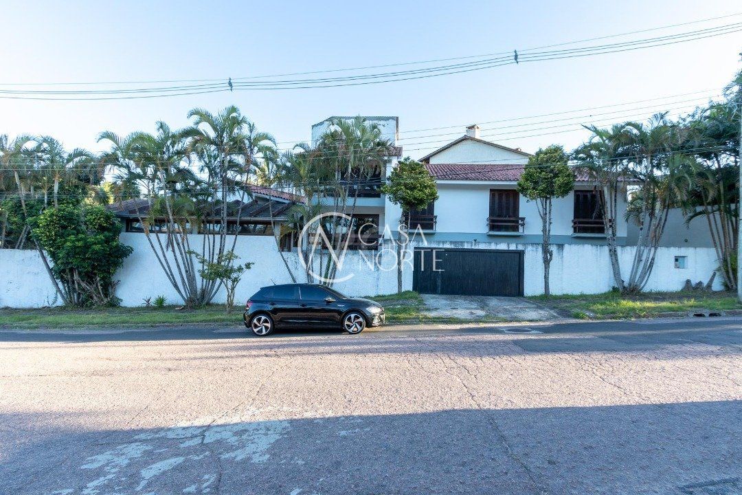 Casa à venda com 4 quartos, 558m², 4 suítes, 6 vagas, Rua Doutor Guilherme Schultz Filho no bairro Jardim Isabel em Porto Alegre