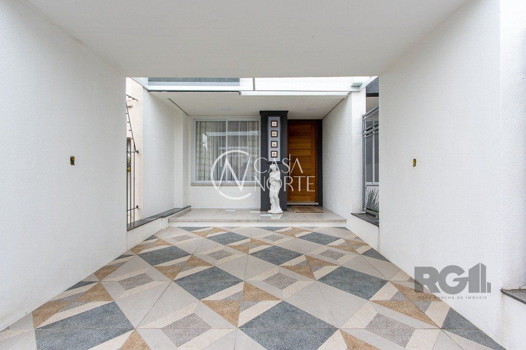 Casa à venda com 3 quartos, 161m², 3 suítes, 2 vagas, Rua Heitor Kramer no bairro Guarujá em Porto Alegre