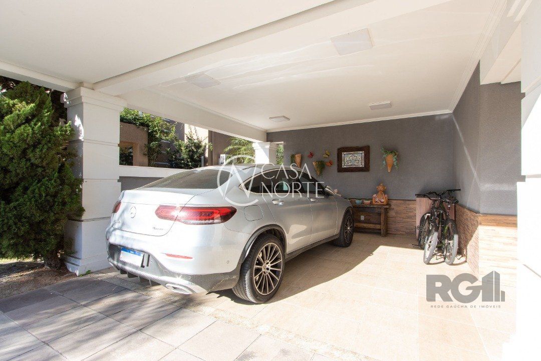 Casa de Condomínio à venda com 3 quartos, 527m², 3 suítes, 4 vagas, Avenida Juca Batista no bairro Terraville em Porto Alegre