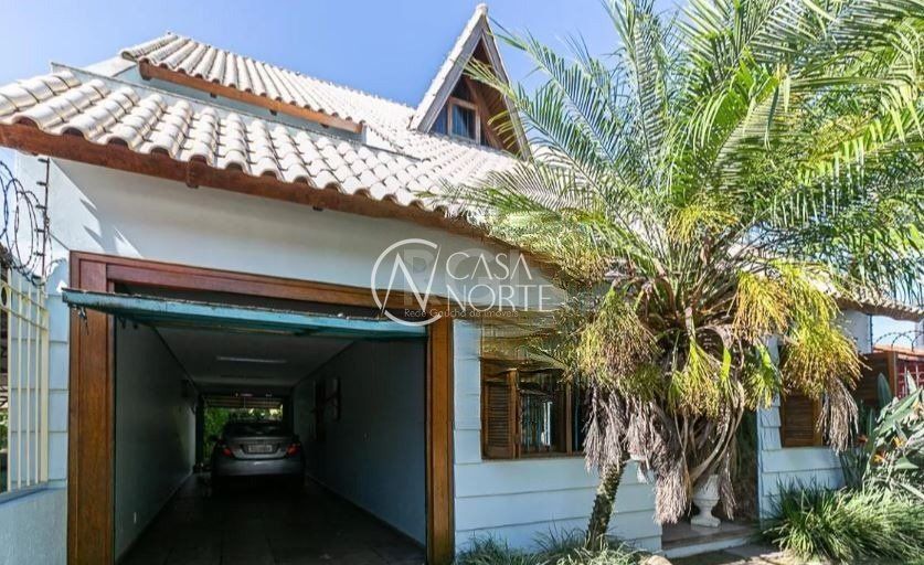 Casa à venda com 4 quartos, 336m², 1 suíte, 2 vagas, Rua São Sebastião do Cai no bairro Camaquã em Porto Alegre