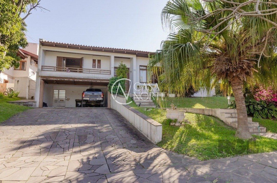 Casa de Condomínio à venda com 3 quartos, 450m², 1 suíte, 3 vagas, Avenida Firmino Octavio Bimbi no bairro Cavalhada em Porto Alegre
