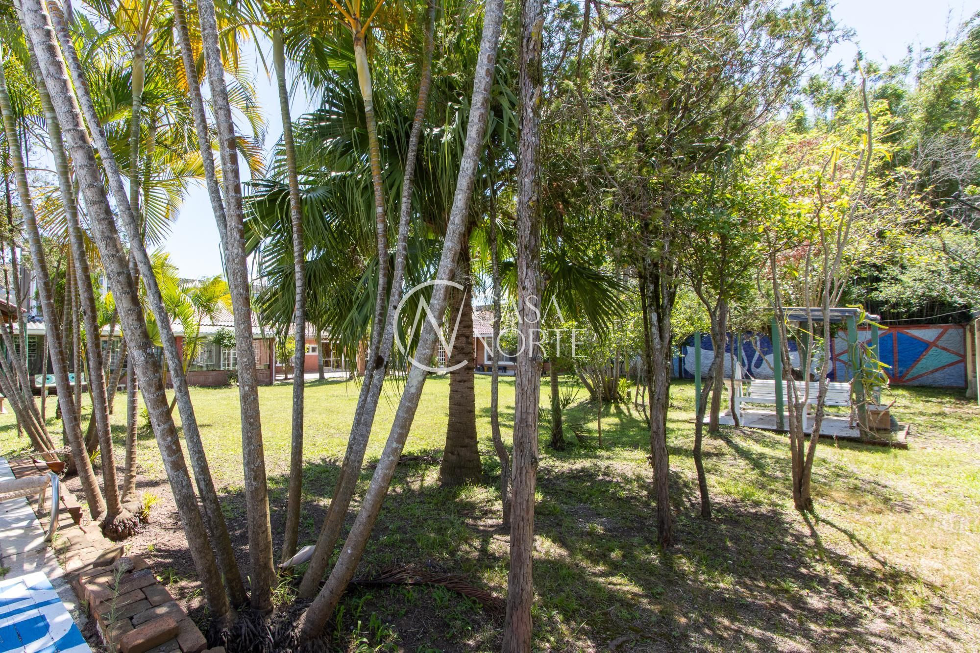 Casa à venda com 4 quartos, 520m², 2 suítes, 5 vagas, Rua Oiampi no bairro Guarujá em Porto Alegre