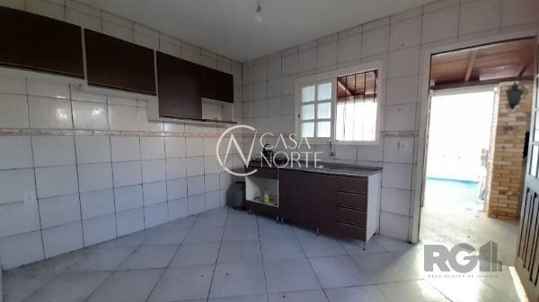Casa à venda com 3 quartos, 190m², 1 suíte, 2 vagas, Rua Samuel Wainstein no bairro Hípica em Porto Alegre