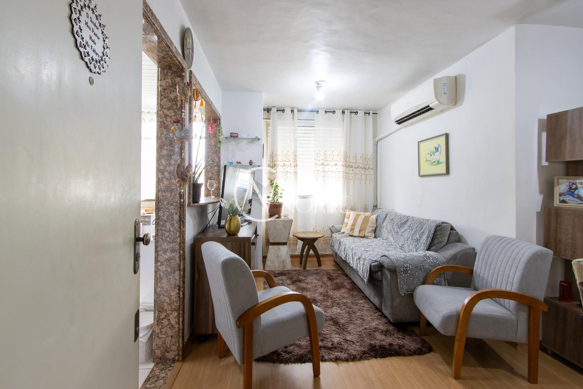 Apartamento à venda com 2 quartos, 52m², 1 vaga, Rua Joaquim de Carvalho no bairro Vila Nova em Porto Alegre