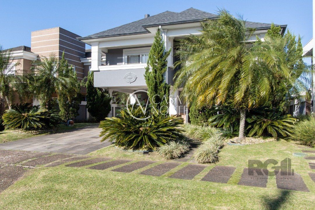 Casa de Condomínio à venda com 3 quartos, 527m², 3 suítes, 4 vagas, Avenida Juca Batista no bairro Terraville em Porto Alegre