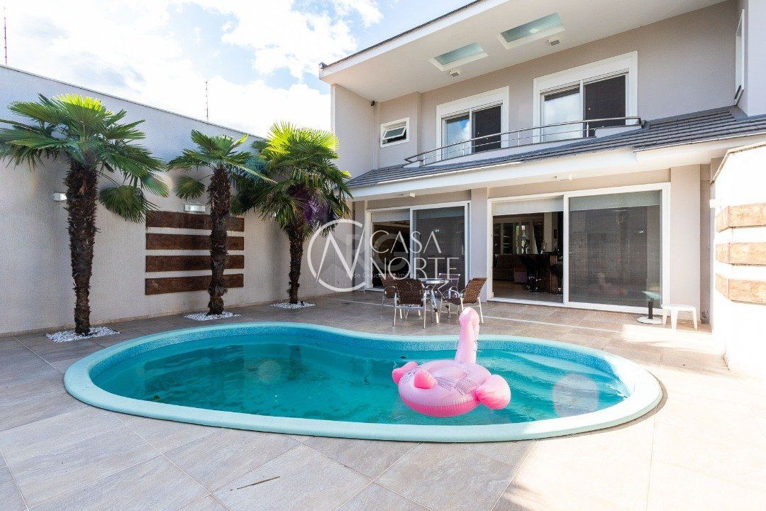 Casa à venda com 4 quartos, 463m², 4 suítes, 4 vagas, Rua Engenheiro Jorge Porto no bairro Ipanema em Porto Alegre