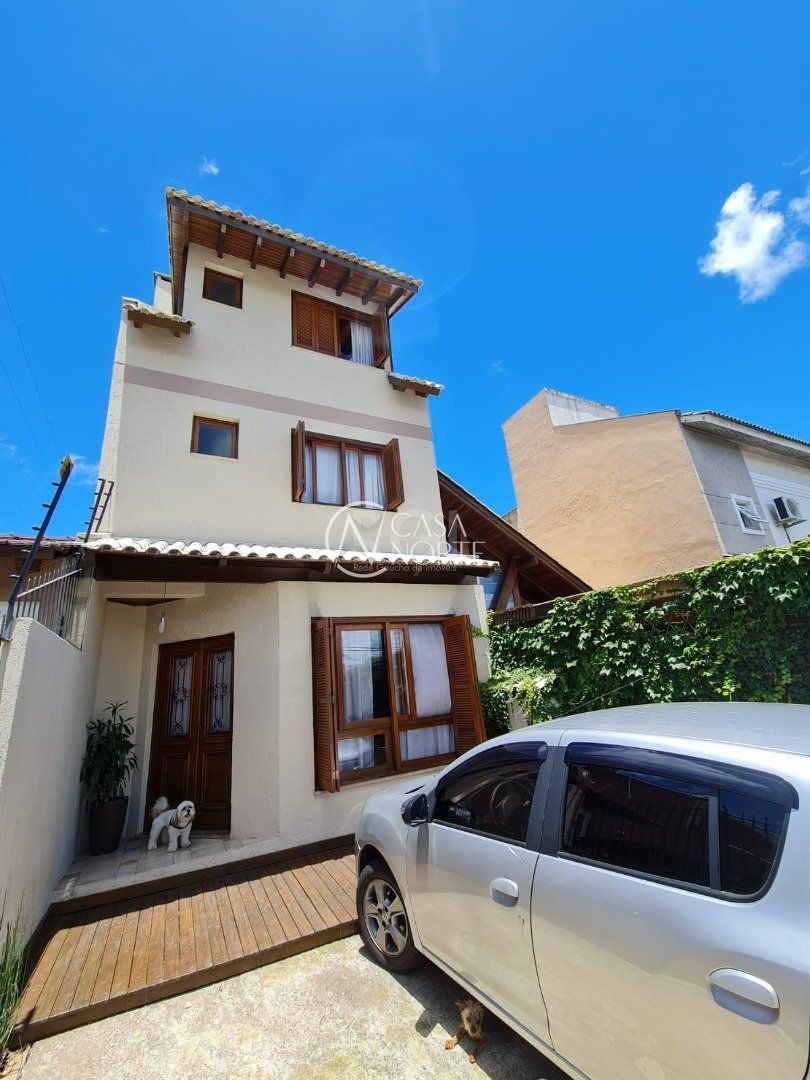 Casa à venda com 3 quartos, 182m², 3 suítes, 2 vagas, Rua Claudio da Silva Pinto no bairro Espírito Santo em Porto Alegre