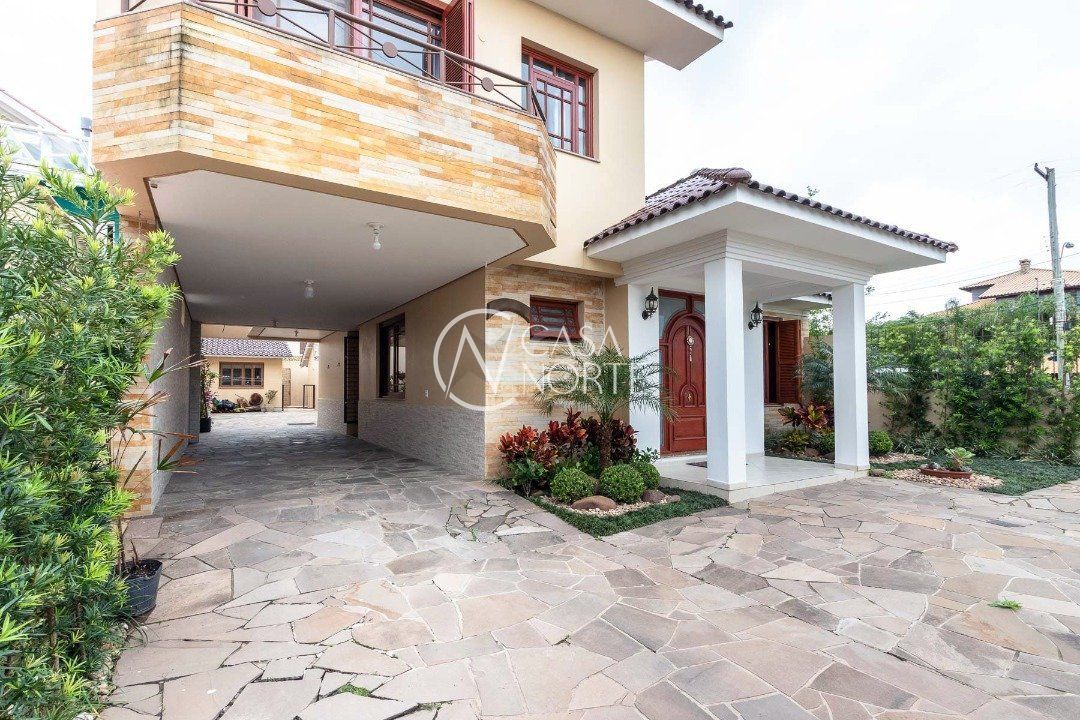 Casa à venda com 3 quartos, 293m², 1 suíte, 6 vagas, Avenida Guaiba no bairro Serraria em Porto Alegre