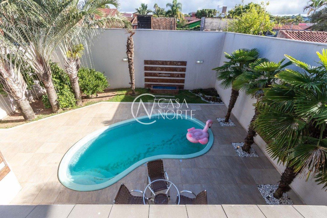 Casa à venda com 4 quartos, 463m², 4 suítes, 4 vagas, Rua Engenheiro Jorge Porto no bairro Ipanema em Porto Alegre