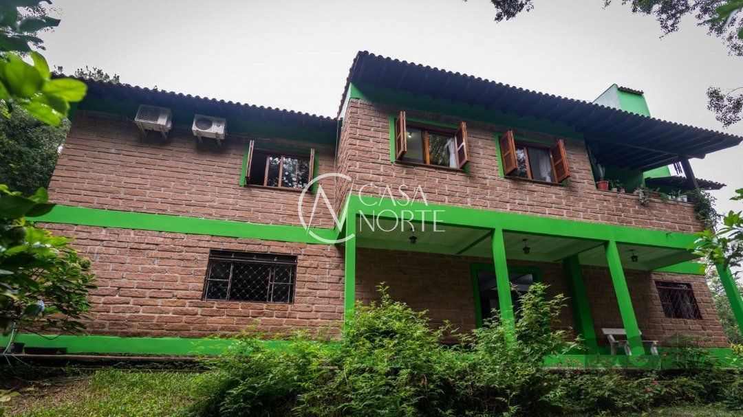 Casa à venda com 6 quartos, 562m², 5 vagas, Rua Monteverde no bairro Cascata em Porto Alegre