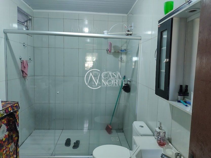 Casa à venda com 2 quartos, 156m², 3 vagas, Rua dos Biazetto no bairro Campo Novo em Porto Alegre