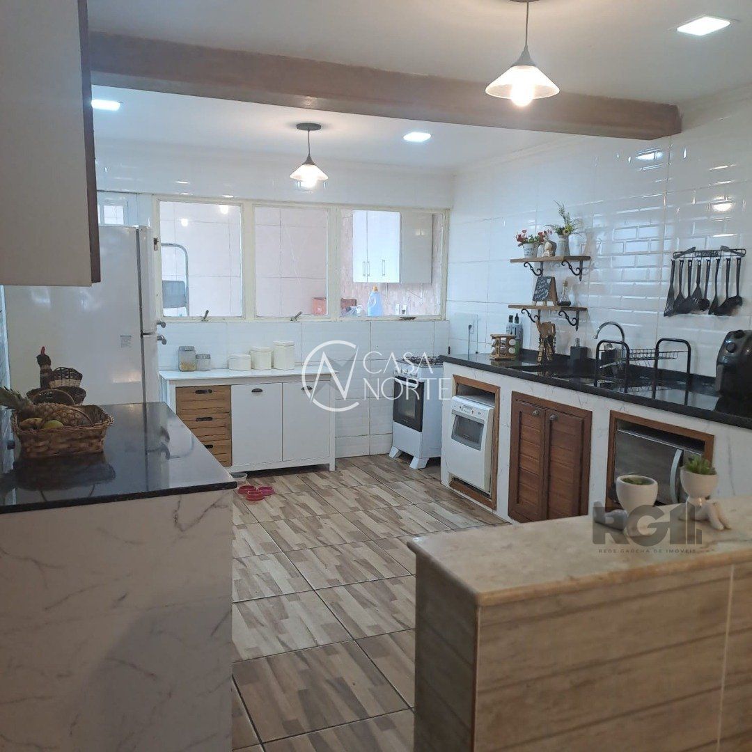 Casa à venda com 3 quartos, 140m², 1 suíte, 3 vagas, Rua Angico no bairro Hípica em Porto Alegre