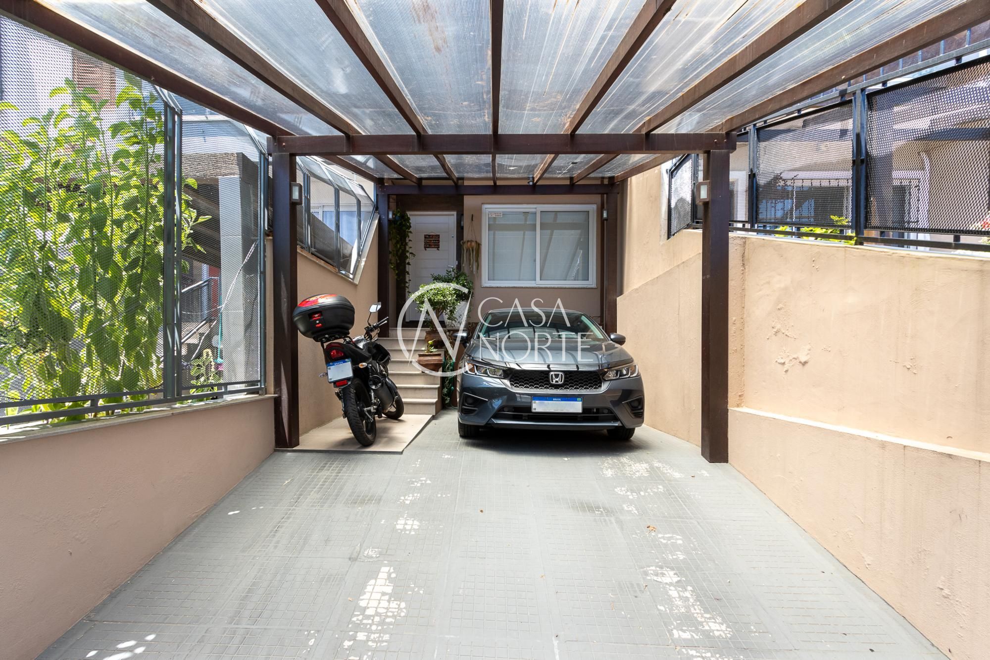 Casa à venda com 2 quartos, 95m², 2 suítes, 2 vagas, Rua Doutor Cláudio Walter Ferreira da Silva no bairro Guarujá em Porto Alegre