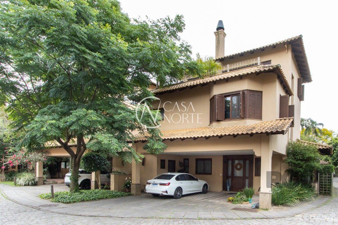 Casa de Condomínio à venda com 3 quartos, 339m², 1 suíte, 2 vagas, Avenida Otto Niemeyer no bairro Tristeza em Porto Alegre