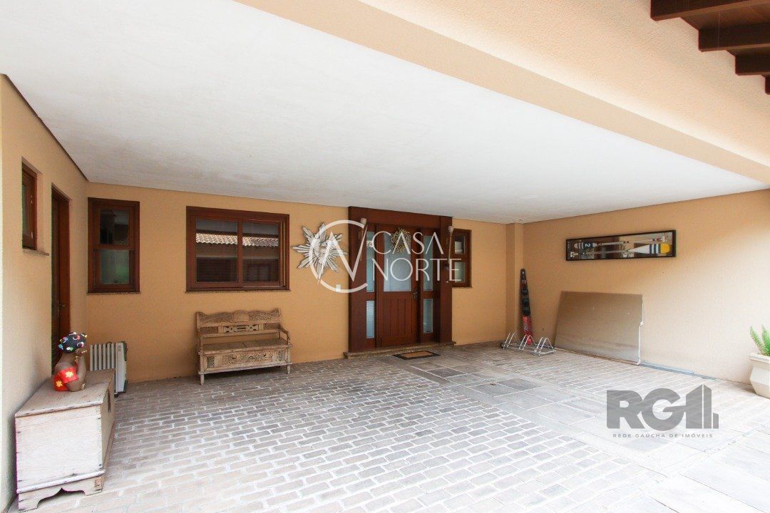 Casa de Condomínio à venda com 3 quartos, 327m², 3 suítes, 3 vagas, Avenida Otto Niemeyer no bairro Tristeza em Porto Alegre