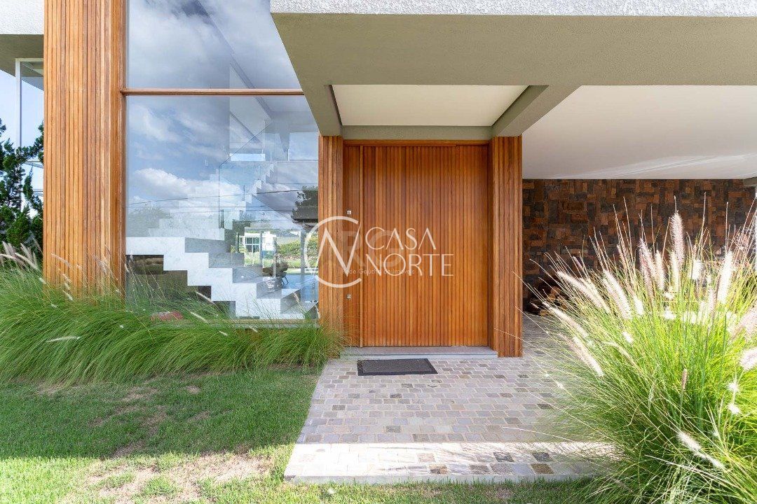Casa de Condomínio à venda com 3 quartos, 411m², 3 suítes, 6 vagas, Avenida Juca Batista no bairro Belém Novo em Porto Alegre