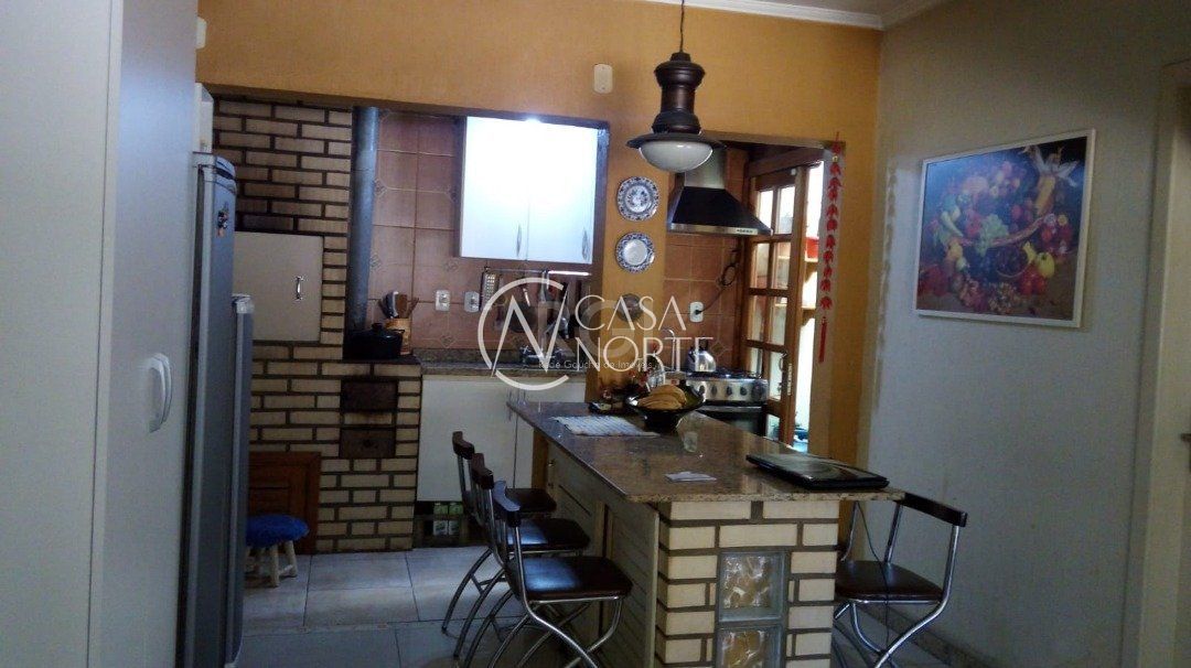 Casa à venda com 3 quartos, 94m², 2 vagas, Rua Cangussu no bairro Nonoai em Porto Alegre