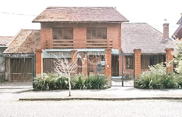 Casa à venda com 4 quartos, 404m², 1 suíte, 7 vagas, Rua Guaiana no bairro Vila Assunção em Porto Alegre