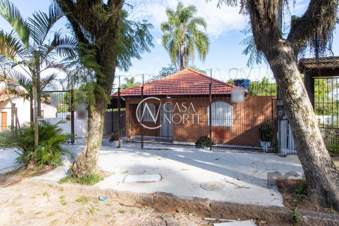 Casa à venda com 3 quartos, 186m², 2 vagas, Rua Doutor Egydio Michaelsen no bairro Ipanema em Porto Alegre