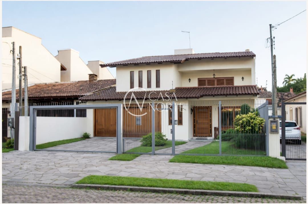 Casa à venda com 5 quartos, 392m², 3 suítes, 4 vagas, Avenida Pereira Passos no bairro Vila Assunção em Porto Alegre