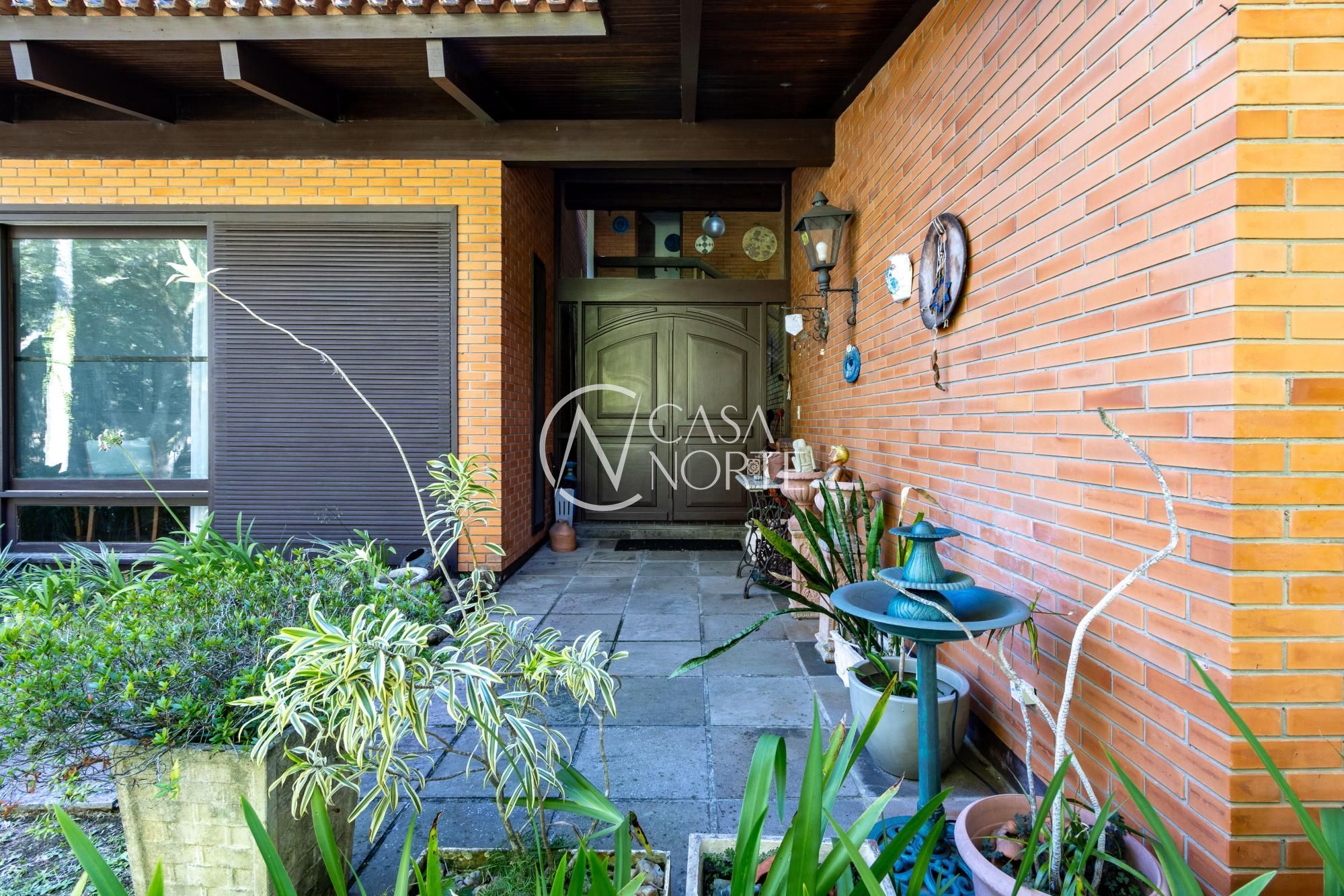 Casa de Condomínio à venda com 4 quartos, 394m², 4 suítes, 4 vagas, Avenida da Cavalhada no bairro Cavalhada em Porto Alegre