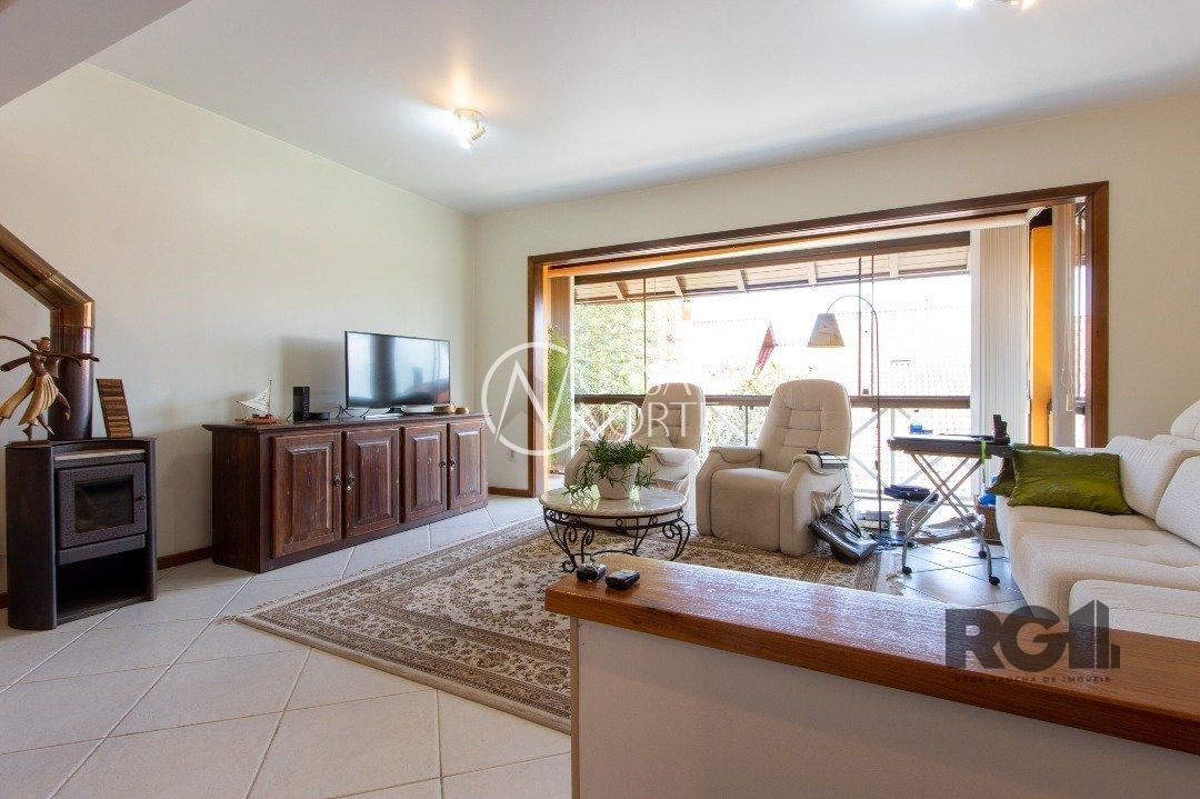 Casa de Condomínio à venda com 3 quartos, 274m², 1 suíte, 2 vagas, Rua Álvaro Guterres no bairro Tristeza em Porto Alegre