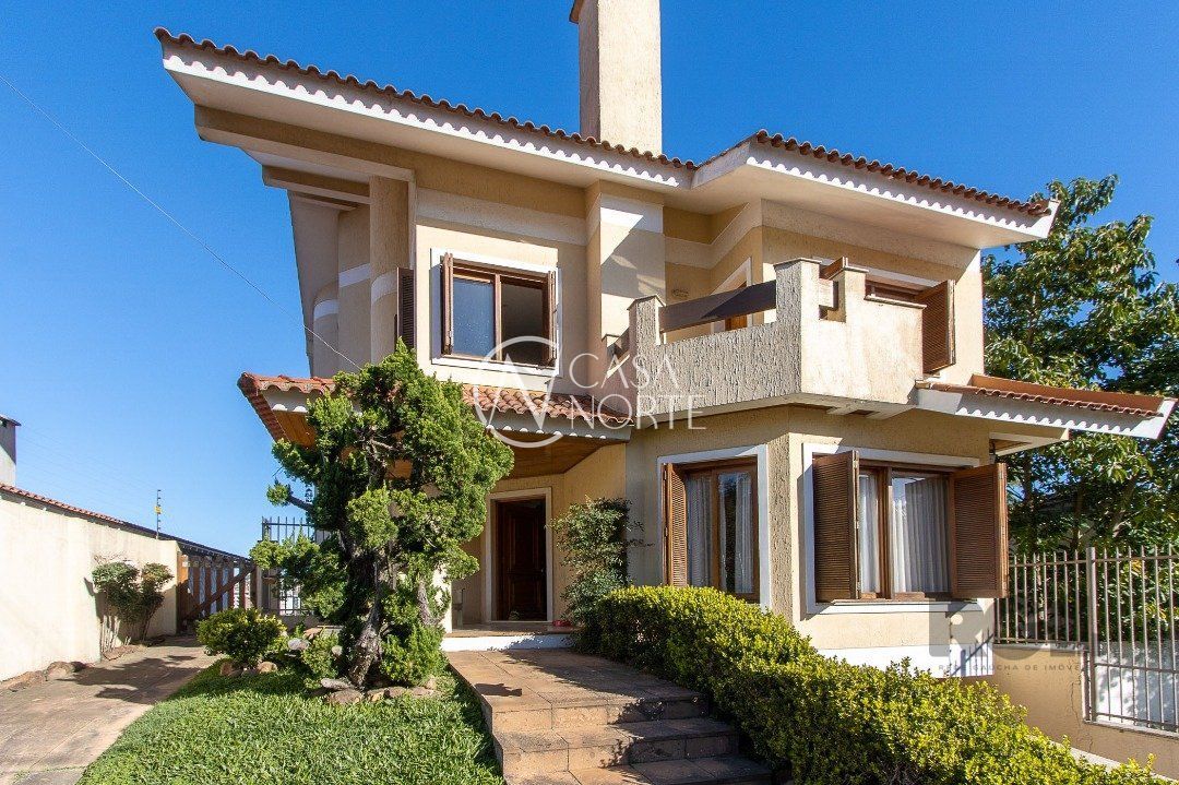 Casa à venda com 4 quartos, 450m², 4 suítes, 5 vagas, Rua Chiriguano no bairro Vila Assunção em Porto Alegre