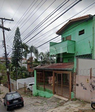Casa à venda com 3 quartos, 360m², 1 vaga, Rua Oscar Schneider no bairro Medianeira em Porto Alegre