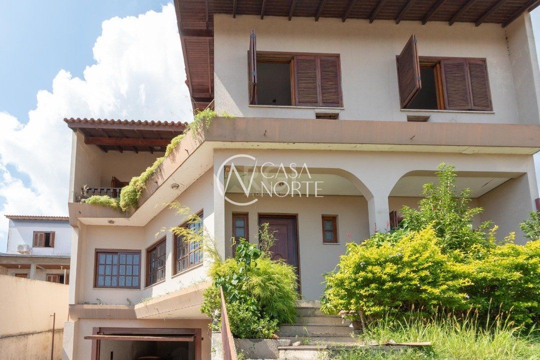 Casa à venda com 4 quartos, 460m², 1 suíte, 4 vagas, Avenida Jacui no bairro Cristal em Porto Alegre