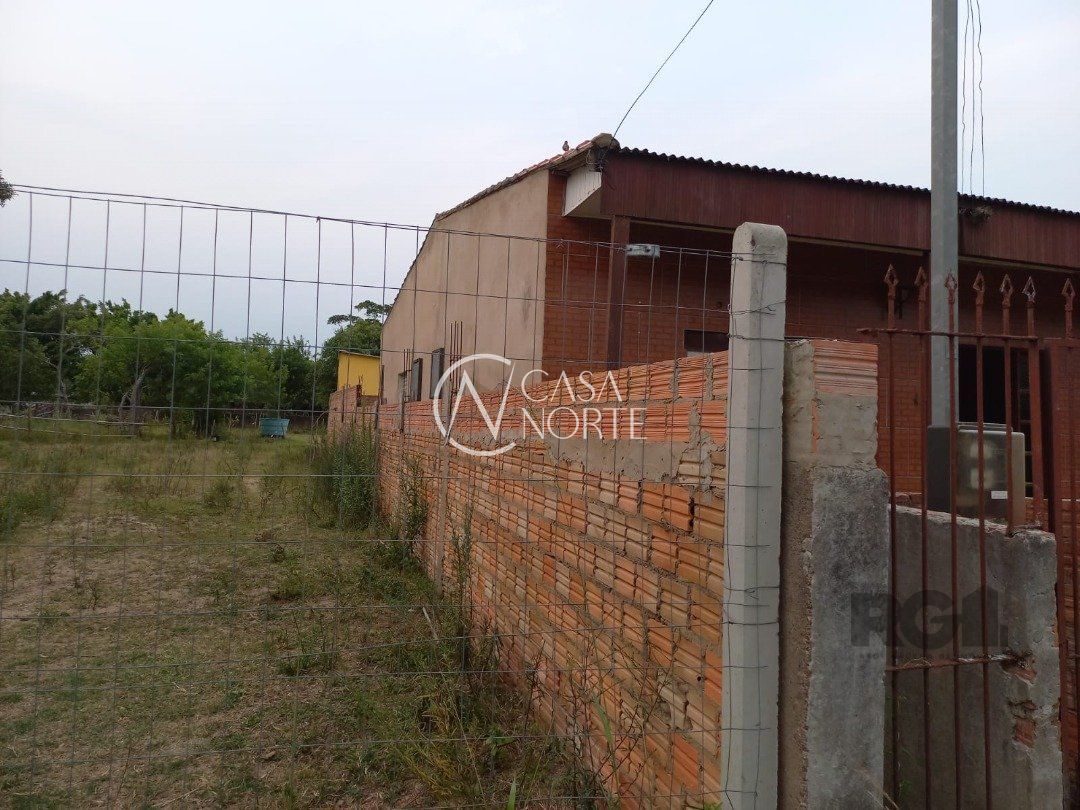 Casa à venda com 3 quartos, 132m², 1 suíte, 3 vagas, Rua Horacildo Albuquerque do Canto no bairro Lami em Porto Alegre