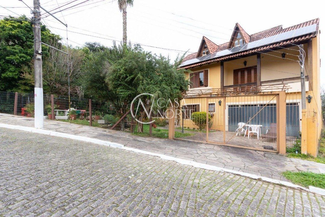 Casa de Condomínio à venda com 3 quartos, 386m², 2 suítes, 2 vagas, Rua Professor Antônio José Remiao no bairro Espírito Santo em Porto Alegre