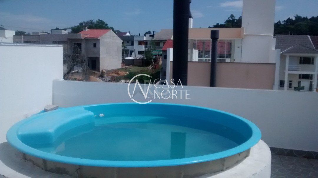 Casa à venda com 3 quartos, 194m², 1 suíte, Rua Roberto Santini no bairro Hípica em Porto Alegre