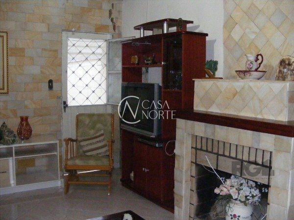 Casa à venda com 3 quartos, 245m², 1 suíte, 3 vagas, Rua Victor Issler no bairro Espírito Santo em Porto Alegre