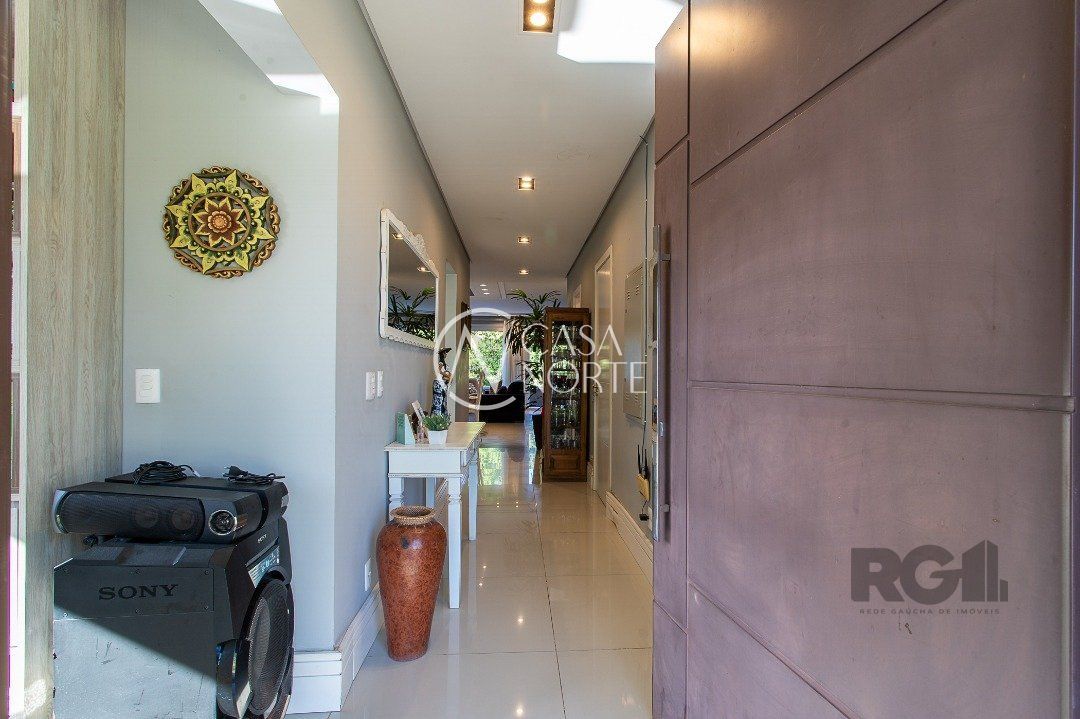 Casa de Condomínio à venda com 4 quartos, 219m², 4 suítes, 2 vagas, Avenida Juca Batista no bairro Terraville em Porto Alegre