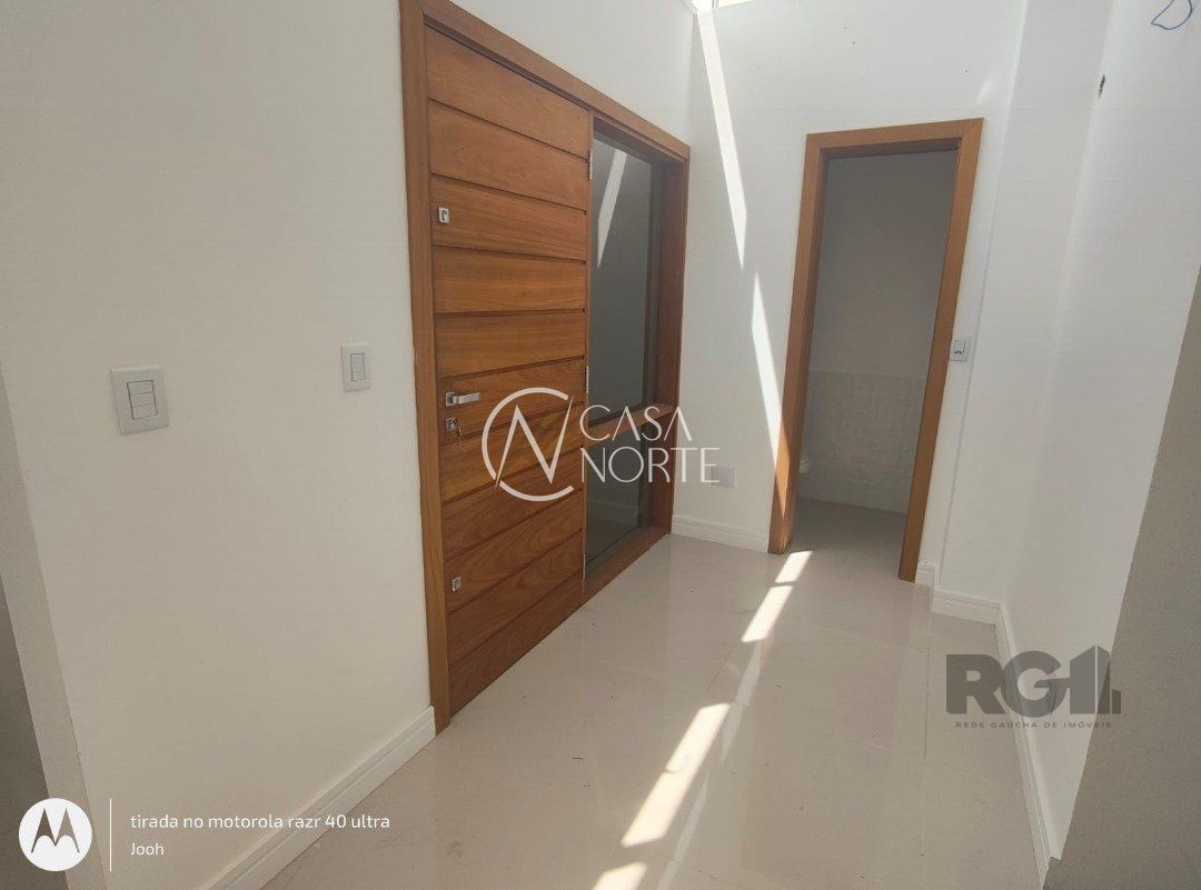 Casa de Condomínio à venda com 3 quartos, 185m², 1 suíte, 2 vagas, Rua Adriano Pereira da Silva no bairro Vila Nova em Porto Alegre