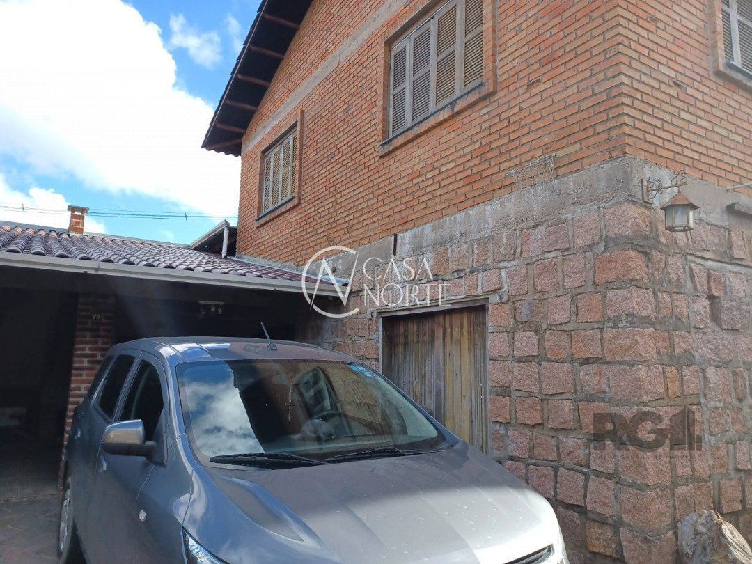 Casa à venda com 3 quartos, 144m², 2 vagas, Estrada João Passuelo no bairro Vila Nova em Porto Alegre