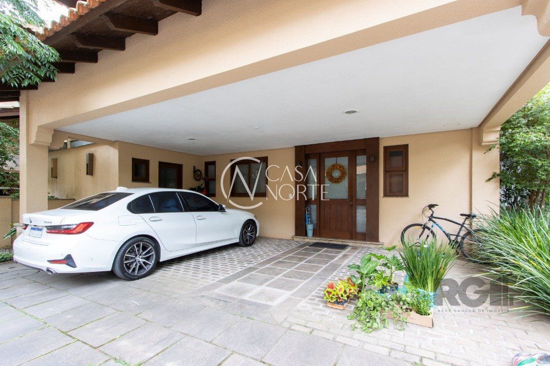 Casa de Condomínio à venda com 3 quartos, 339m², 1 suíte, 2 vagas, Avenida Otto Niemeyer no bairro Tristeza em Porto Alegre